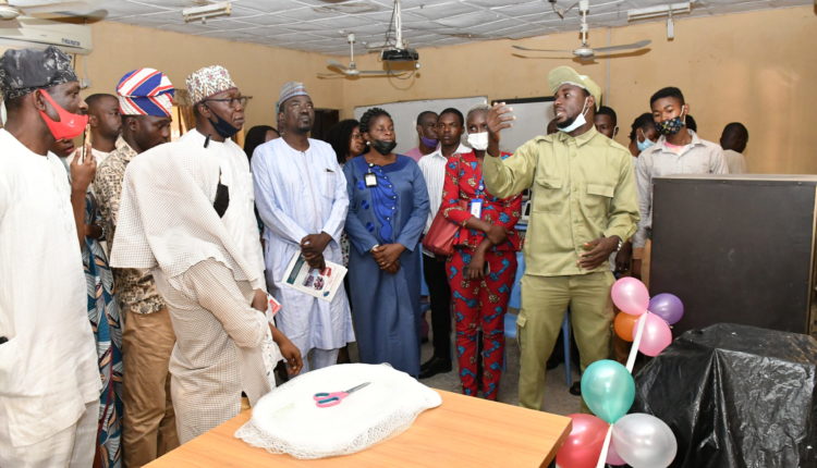 NYSC Member Umar Farouk Ahmad Commissions Solar Inverter in FCT Schools