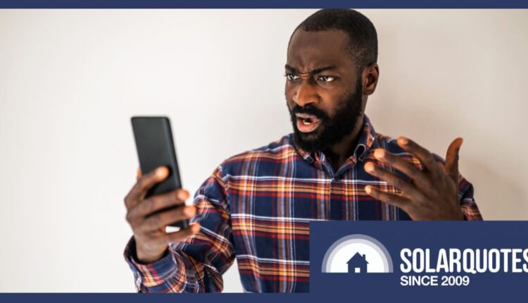 a man frustrated at his phone